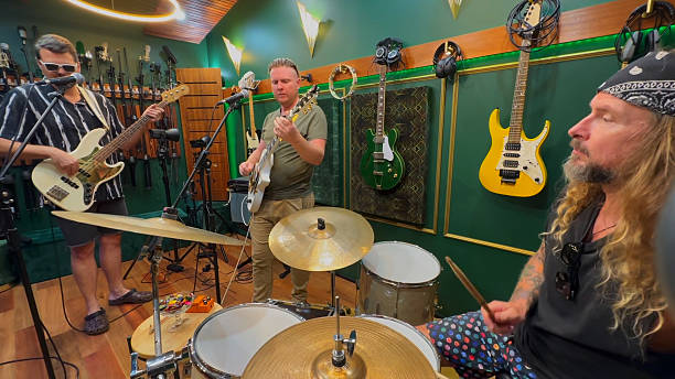 istock Middle aged men playing together in a band 2226728245