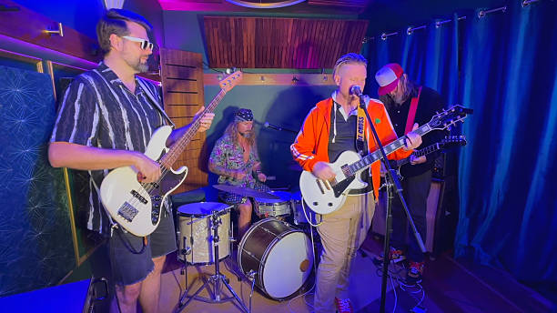 istock Middle aged men playing together in a band 2226728247