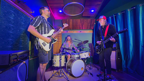 istock Middle aged men playing together in a band 2226728251