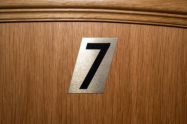 istock Hotel room door with number 7 2226728934