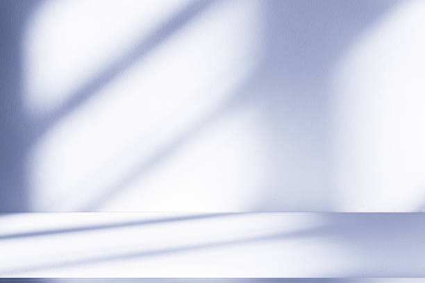 istock Studio style background wall decoration presentation uses white and blue tones. with shadows cast from a nearby window, concept creating a decorative 2226732933