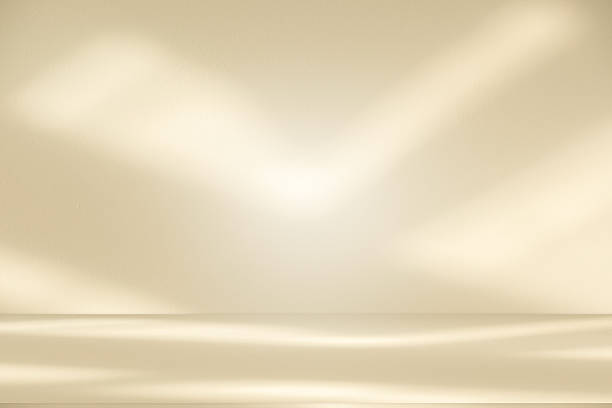 istock Studio style background wall decoration presentation uses white and beige tones. with shadows cast from a nearby window, concept creating a decorative 2226732934