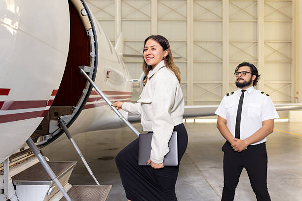 istock Pilot welcoming his first-class passenger on an executive jet 2226735552