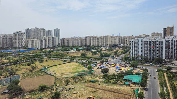Noida, India - Aril 21 2024: Arial view Noida sector 77, 77, 78. with high rise buildings.