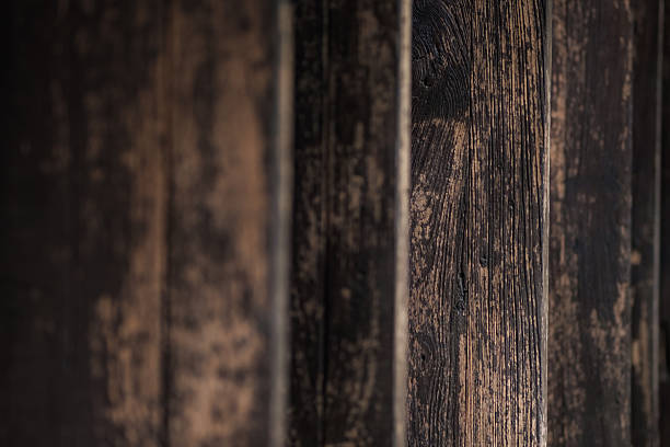 istock stacked wood plank shot with blurred background and forground 2226745151