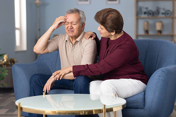 istock Senior couple sadness problems sitting on sofa at home stock photo 2226747088
