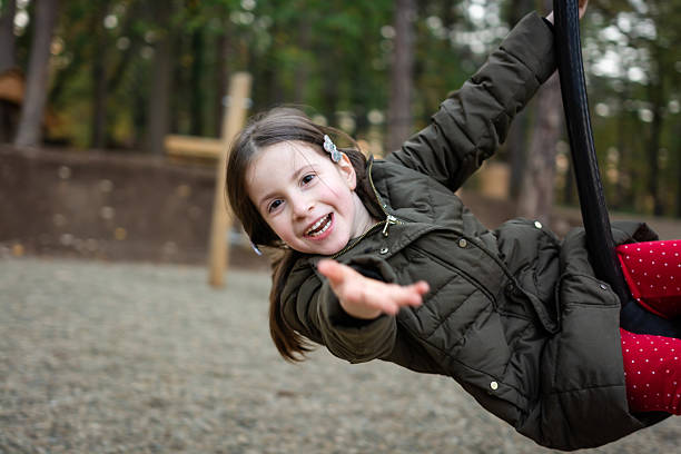istock Girl having fun playing at the playground 2226750188