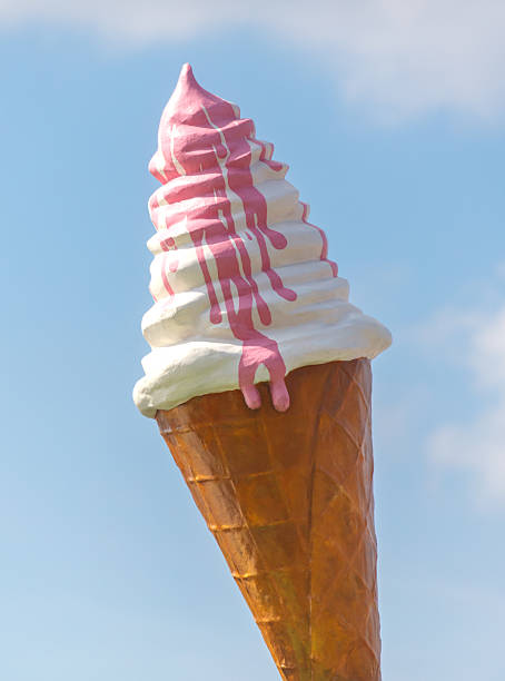istock A large ice cream cone with pink drizzle on top 2226751004