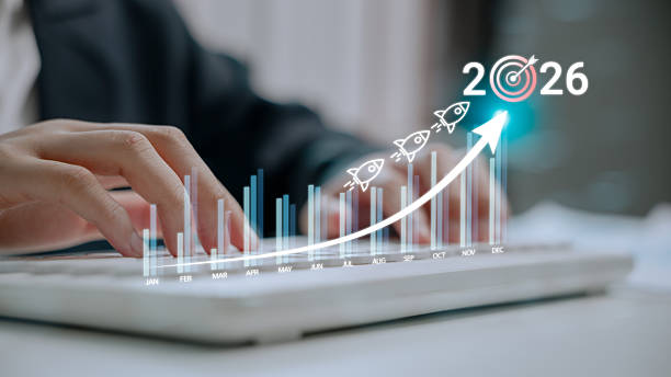 istock Hands typing on keyboard with growth chart and rocket icons aiming at 2026 target. Concept of business development, success strategy, annual performance tracking, and goal planning for the future. 2226751695