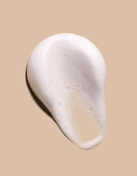 istock texture foam mousse foam cosmetic smear sample on beige background 2226755575