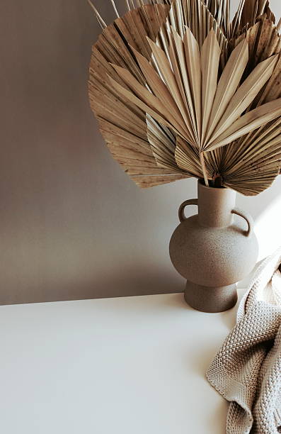 istock Modern ceramic vase with dry palm leaves 2226755579