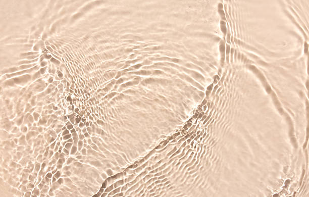 istock water texture ripples wave clean transparent water abstract background in beige color 2226755584