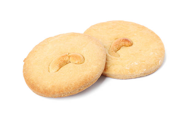 istock Two tasty cashew cookies isolated on white 2226757237