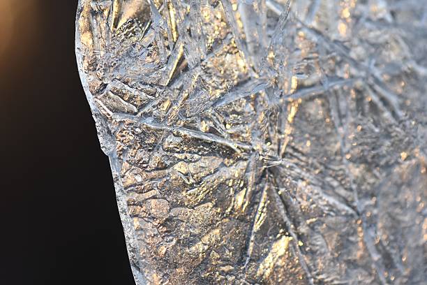 istock Closeup of ice on the window at sunset 2226758596