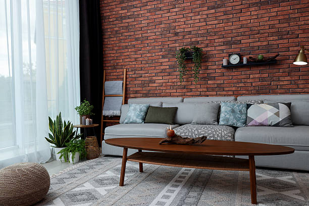 istock Modern living room interior. Comfortable sofa near brick wall 2226761666