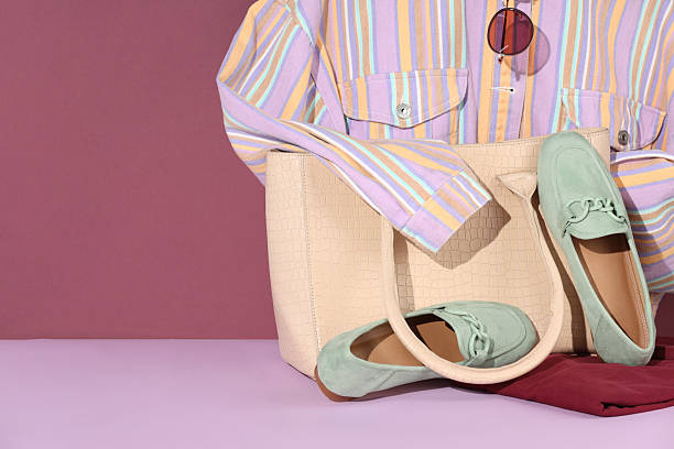 istock Clothes, shoes, bag and sunglasses on color background, space for text 2226762448
