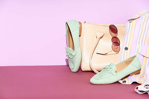istock Clothes, shoes, bag and sunglasses on color background, space for text 2226762465