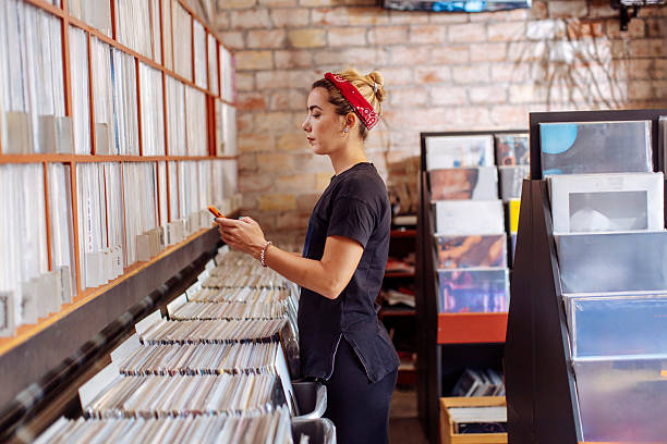 istock Woman Browsing Vinyl Records 2226763292