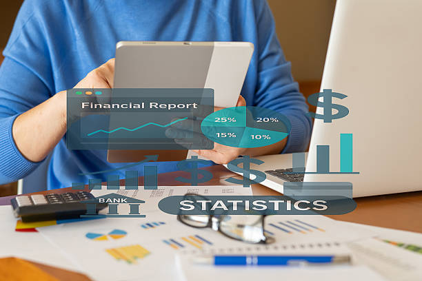istock Businessman analyzing a financial report on a tablet, featuring charts and statistics that highlight banking performance and company profits 2226764711