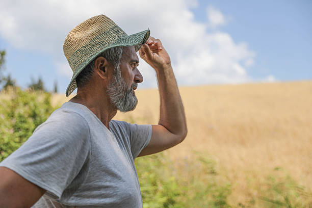 istock Bearded Senior Farmer Standing in Nature 2226767339
