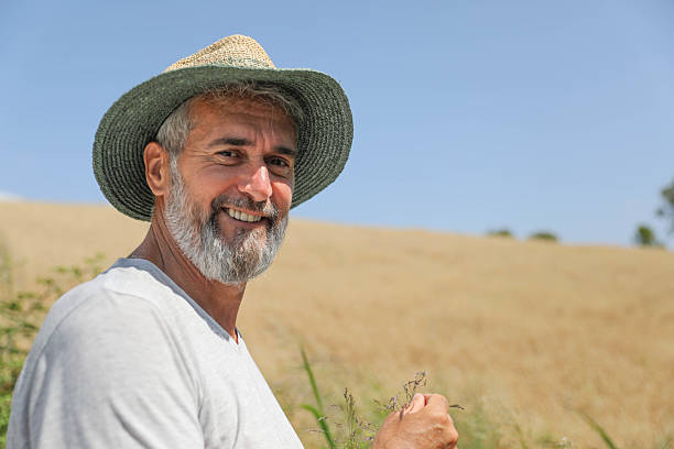 istock Senior Farmer Relaxing in Nature During Summer 2226767493