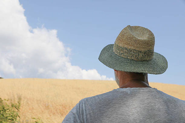 istock Rural Life Scene with Elderly Man and Blue Sky 2226767542
