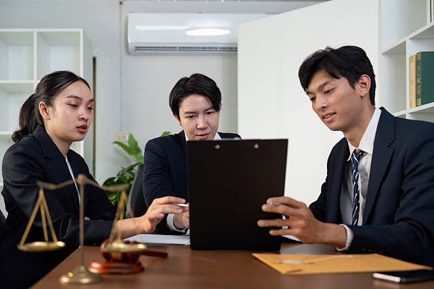 istock Legal Team Collaboration in Modern Office Setting 2226780564