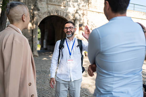 istock Tour guide interacts with tourists during an engaging visit to a historic fort 2226785222