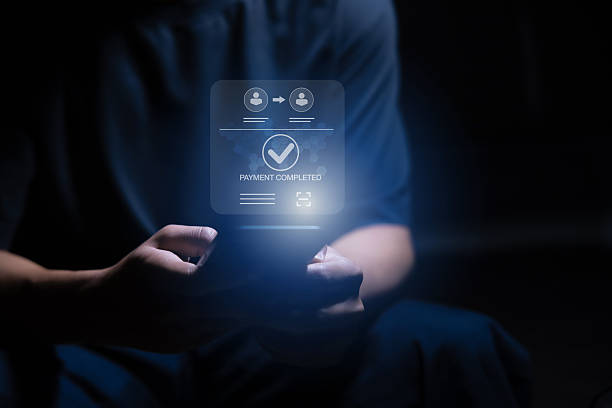 istock Digital banking network, internet payment, financial technology or FinTech concept. Businessman using smartphone with icons on virtual screen, online shopping and payment via mobile banking apps 2226789076