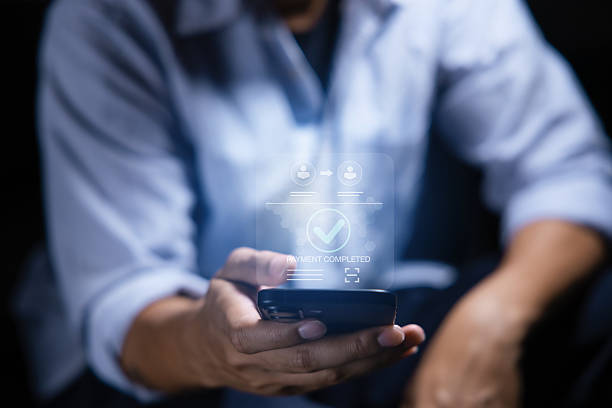 istock Digital banking network, internet payment, financial technology or FinTech concept. Businessman using smartphone with icons on virtual screen, online shopping and payment via mobile banking apps 2226789094
