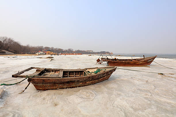 it is impossible to go fishing in winter in lakes and seas where winter is very hard and difficult.fishing boats are waiting on the shore throughout the winter.in difficult winter conditions