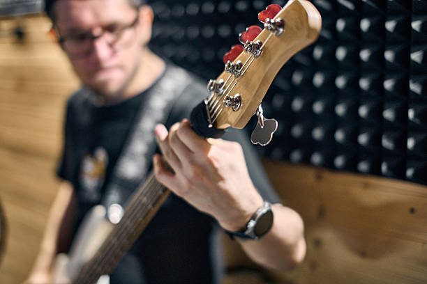 istock Bass player in focus during rehearsal session 2226791214
