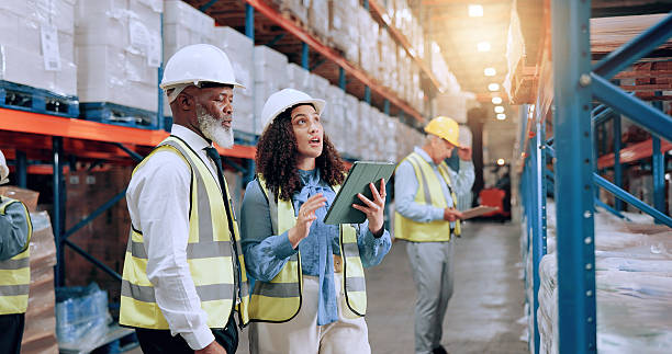 istock Warehouse supervisor, team and tablet for inventory, storage planning and stock inspection. Shipping, engineer and people with technology for collaboration with discussion, logistics and supply chain 2226792340