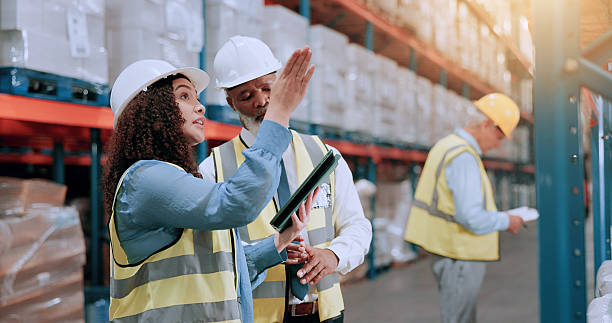 istock Warehouse supervisor, team and tablet for storage, inventory planning and pointing for stock inspection. Shipping, engineer and people with technology for supply chain discussion, logistics and cargo 2226792341