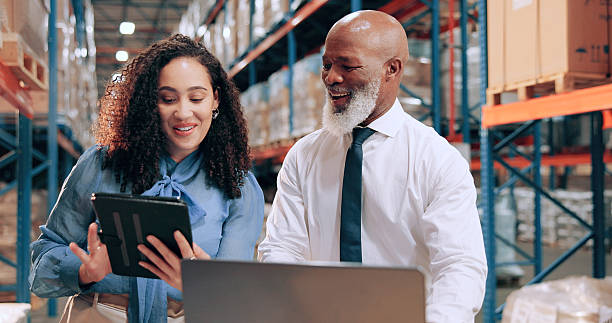 istock Distribution, people or teamwork in warehouse, tablet or online schedule for supply chain. Employees, logistics or meeting with smile, stock or tech for email, quality control or inventory management 2226792468