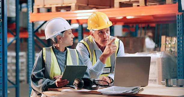 istock Distribution, people and teamwork with tablet, pointing and online with quality assurance. Employees, logistics and meeting with inspection, stock or laptop for email, industry and checklist backlog 2226792483