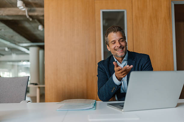 istock Business executive happily discussing via laptop 2226792652