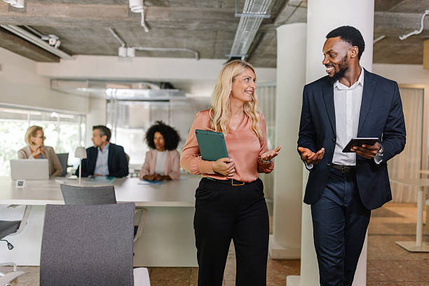 istock Business Team Shares Ideas in Contemporary Setting 2226792965