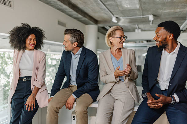 istock Engaged professionals sharing insights in office 2226795854
