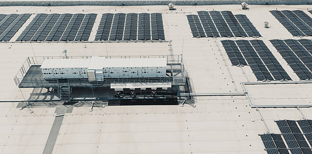 istock Rooftop hvac unit and solar panels generating green energy 2226796714