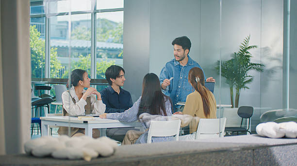 istock Professional team analyzing business projects, Corporate managers brainstorming strategies. Sharing ideas in a consulting session for financial growth. teamwork and corporate development 2226797383