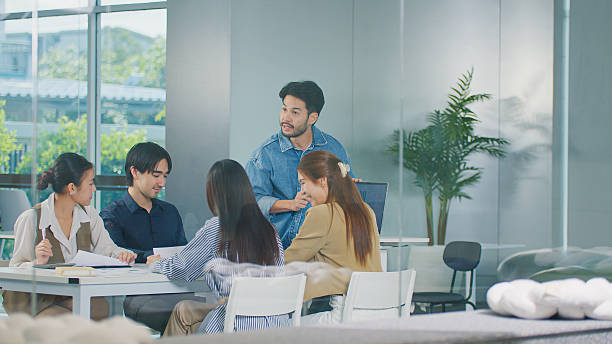 istock Professional team analyzing business projects, Corporate managers brainstorming strategies. Sharing ideas in a consulting session for financial growth. teamwork and corporate development 2226797416