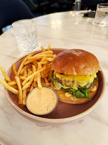 istock Classic Cheeseburger with Fries and Dipping Sauce 2226800360