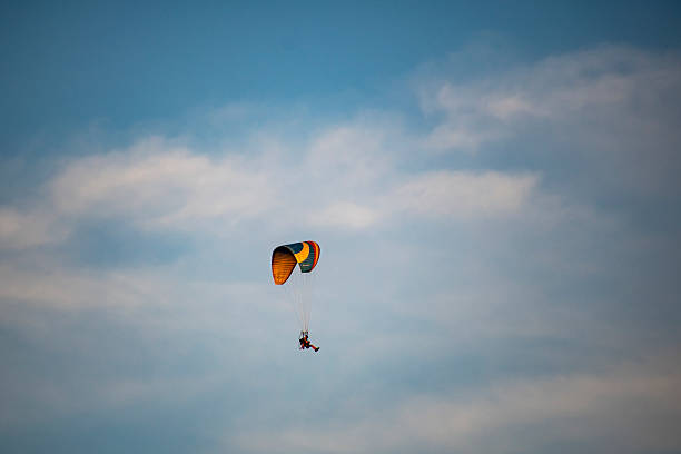 istock Soaring Through the Sky During a Serene Adventure With a Colorful Paraglider 2226805990