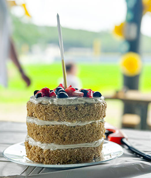 Birthday Cake With Strawberries and Grapes to Celebrate a First Birthday