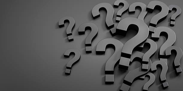 istock Pile of white Question Marks on dark background 2226807866