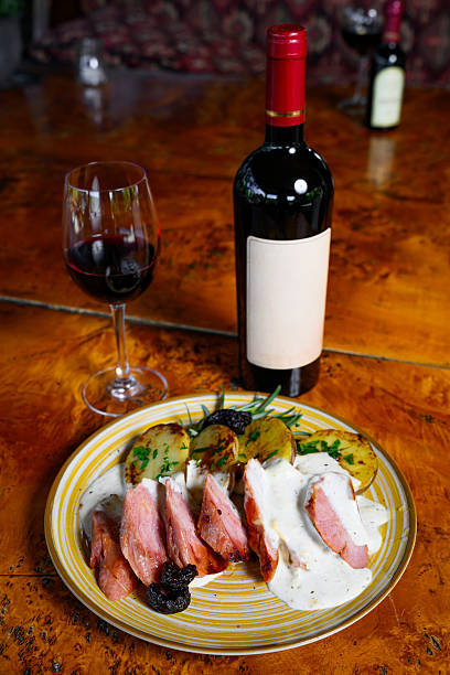 Wine glass beside the plate