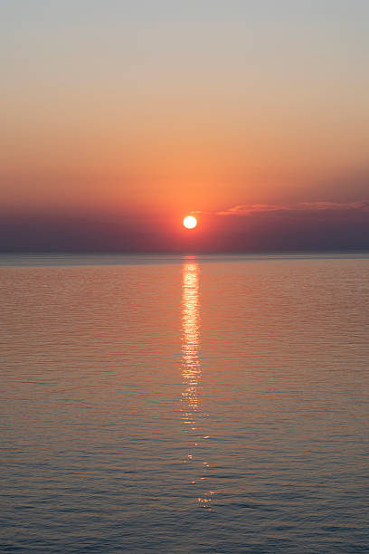 istock Stunning sunset over calm water creates a serene atmosphere in the evening sky 2226819599