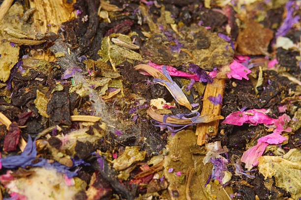 istock Dried herbal blend with colorful flowers and herbs displayed on a wooden surface 2226819951
