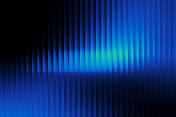 istock Glossy ribbed gradient with deep black, vibrant teal, and electric green tones. A sleek futuristic vibe with refracted glass texture and luminous movement. 2226822545